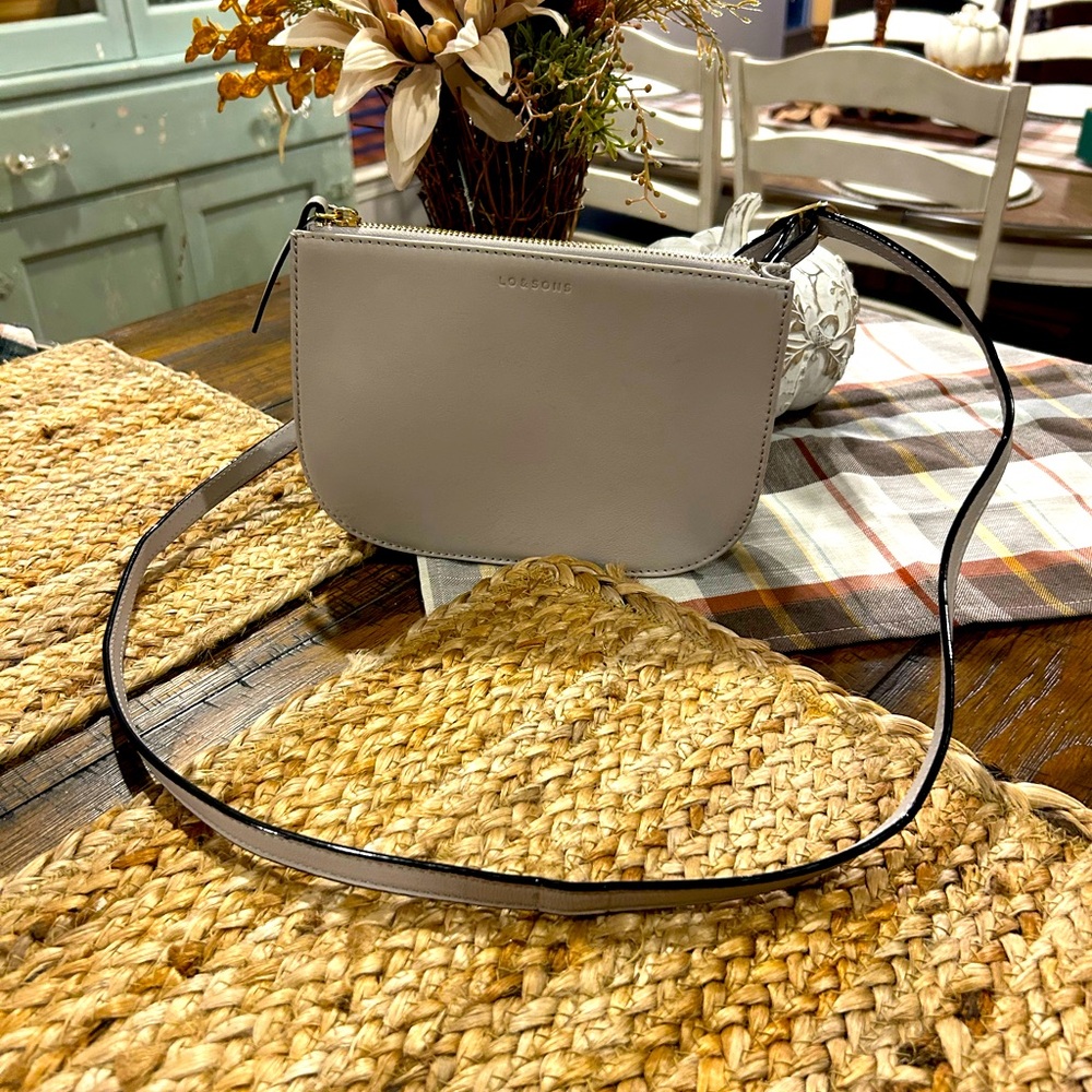 Convertible cross-body bag made of the finest leather.